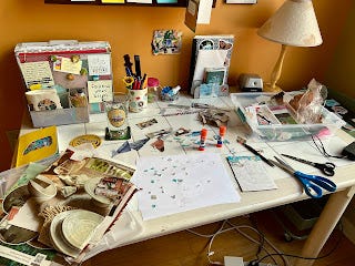 My desk full of papers, scissors, and glue. It's a mess. My desk full of papers, scissors, and glue. It's a mess.