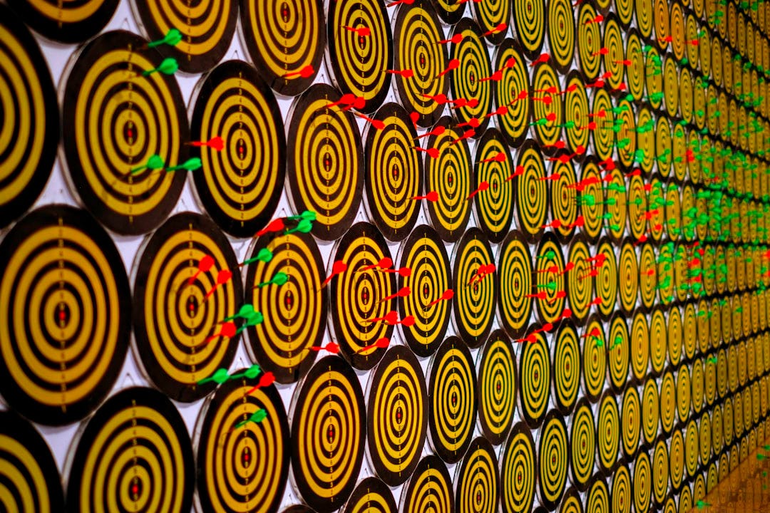 a wall with a lot of circles on it a wall with a lot of circles on it