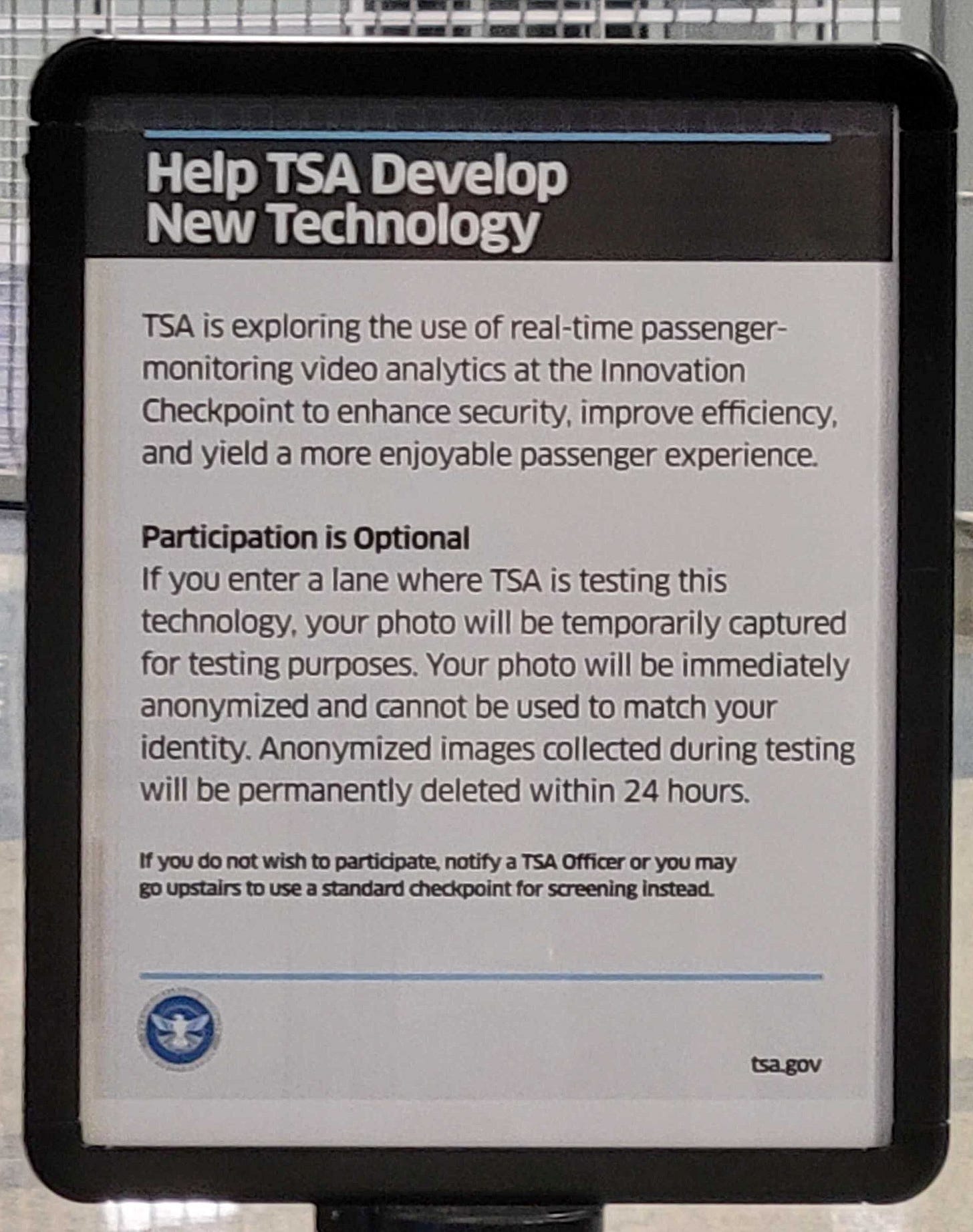A photo of a sign by the TSA warning of the testing of a new video analytics program A photo of a sign by the TSA warning of the testing of a new video analytics program