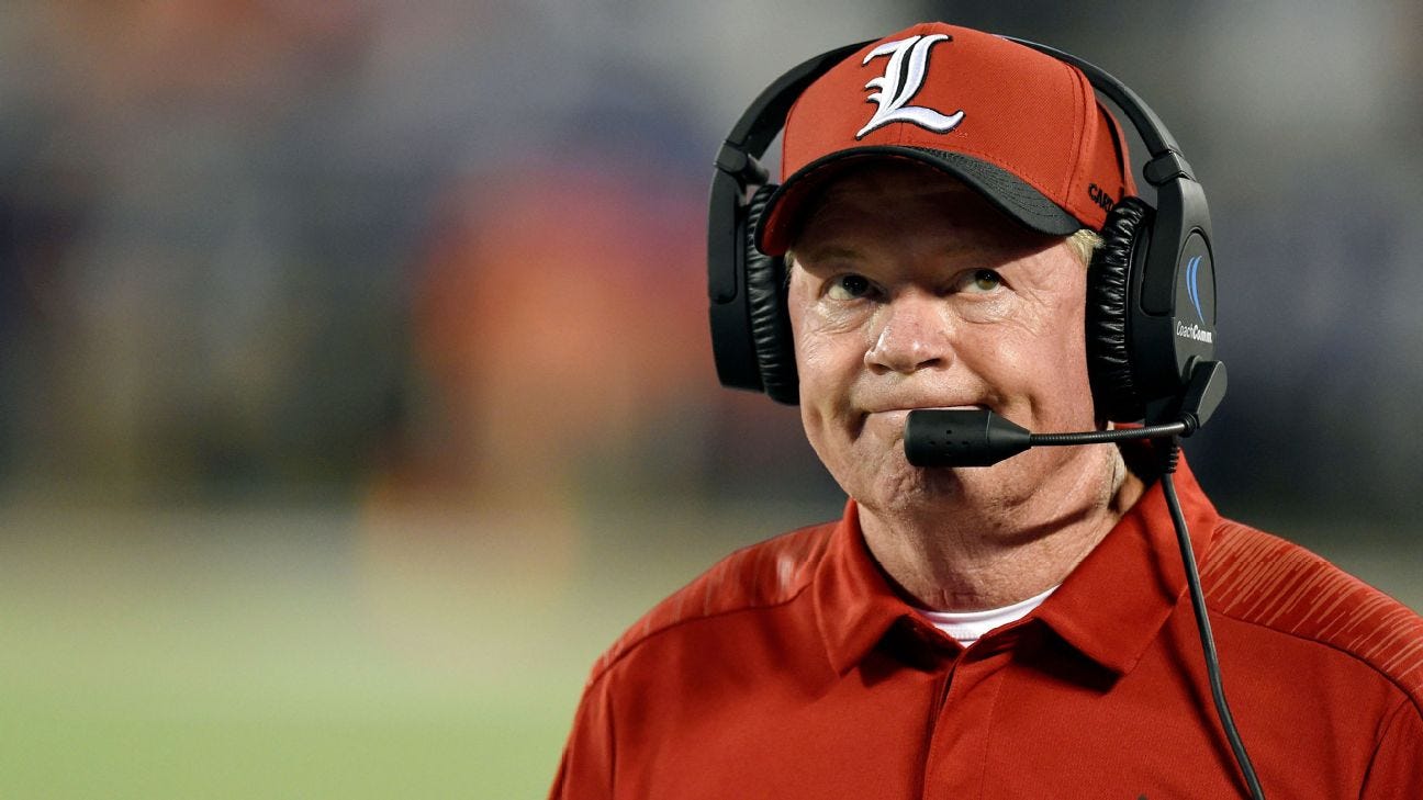 Louisville head coach Bobby Petrino making a sort of sad grimmace face Louisville head coach Bobby Petrino making a sort of sad grimmace face