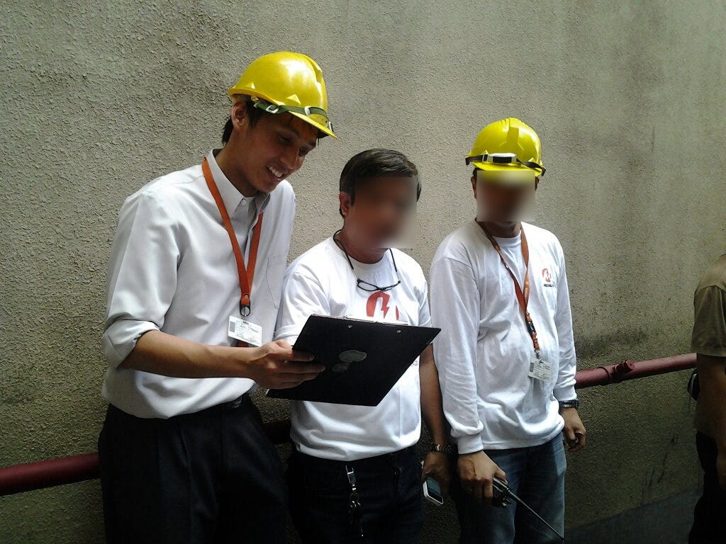 This is me pretending to be busy at a site visit.