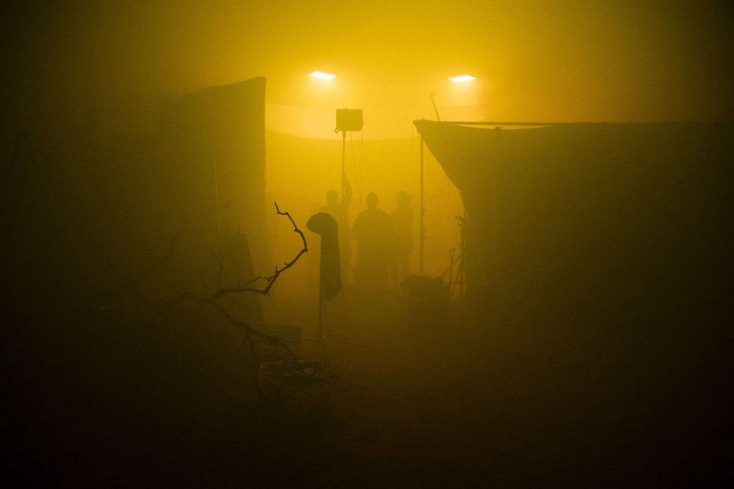 smoke filled film set with three sihouettes photo by gary compton