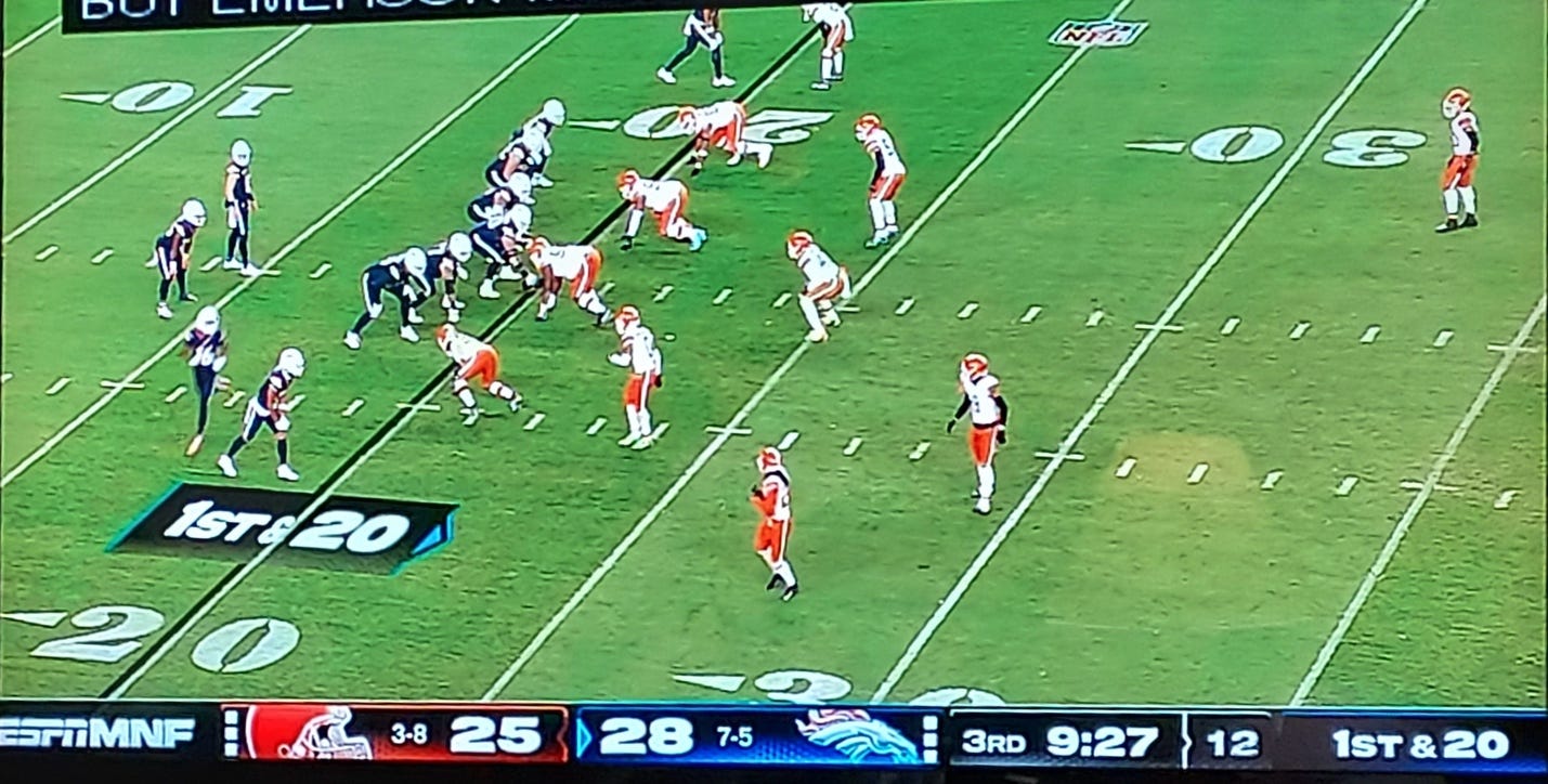 A football game on a television

Description automatically generated