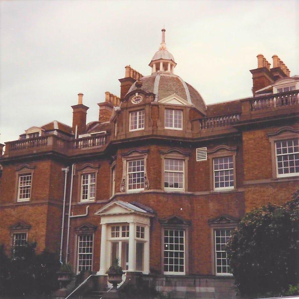 Very impressive and stately building known as Hampton Court House Very impressive and stately building known as Hampton Court House