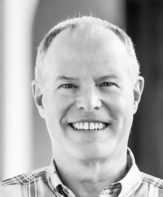 A close-up of a person smiling

AI-generated content may be incorrect.