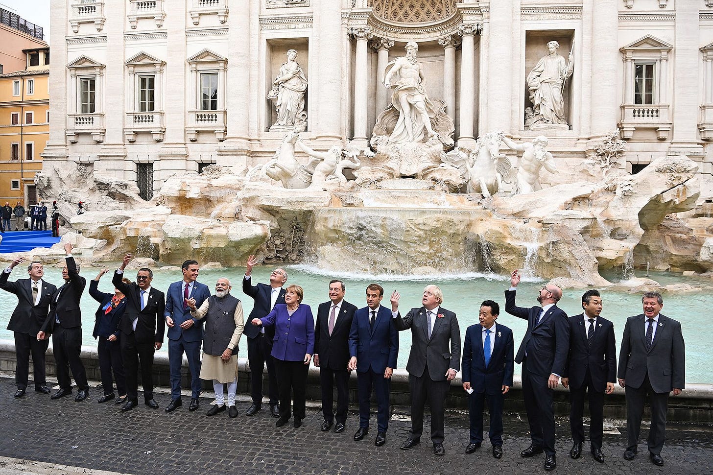Boris Johnson, fifth right, joins G20 leaders during a visit to the Trevi fountain in Rome, on Oct. 31. Boris Johnson, fifth right, joins G20 leaders during a visit to the Trevi fountain in Rome, on Oct. 31.