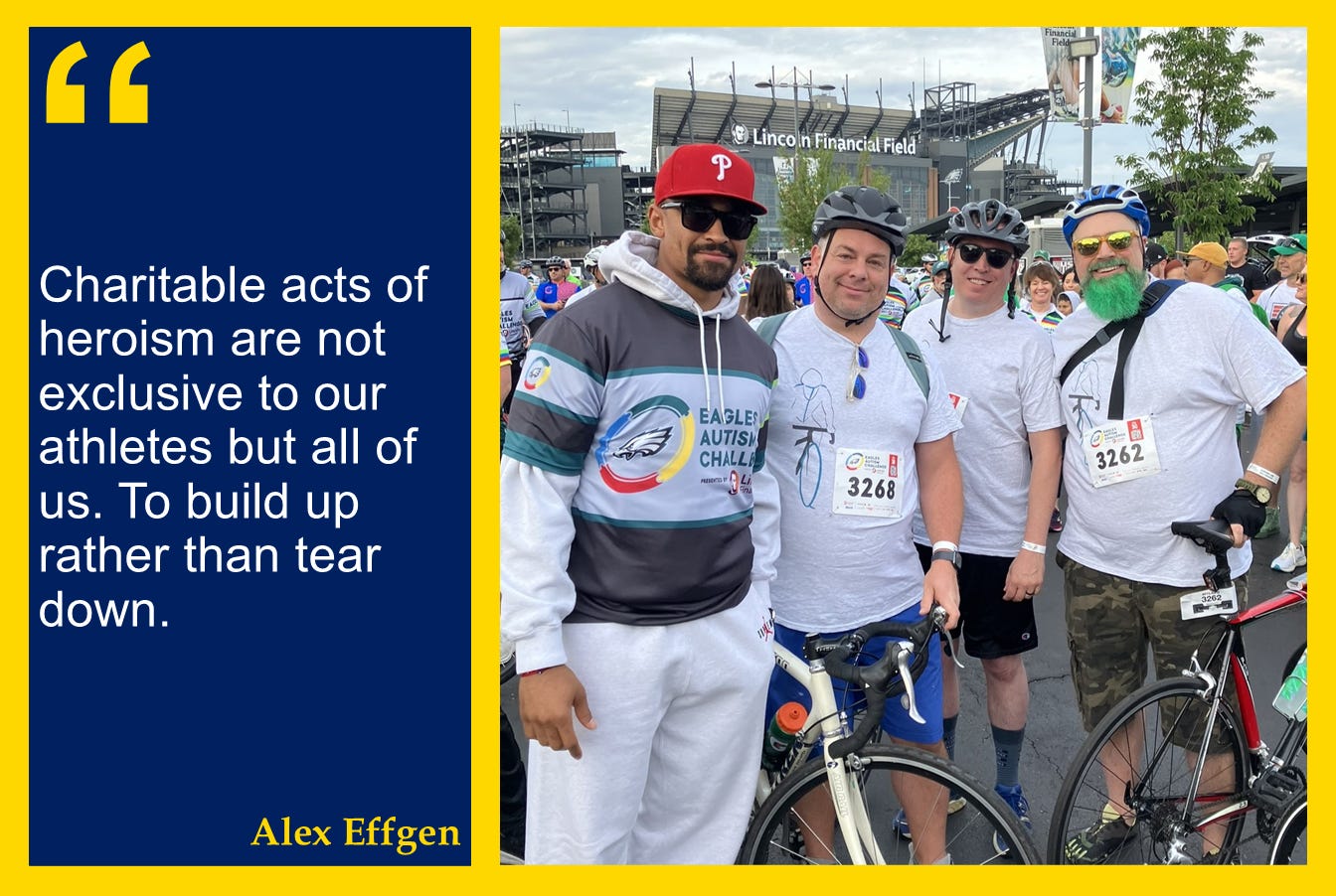 A photo of the TeamQUIRKY2 charity bike team with Philadelphia Eagles QB, Jalen Hurts, with the quote: "Charitable acts of heroism are not exclusive to our athletes but all of us. To build up rather than tear down."