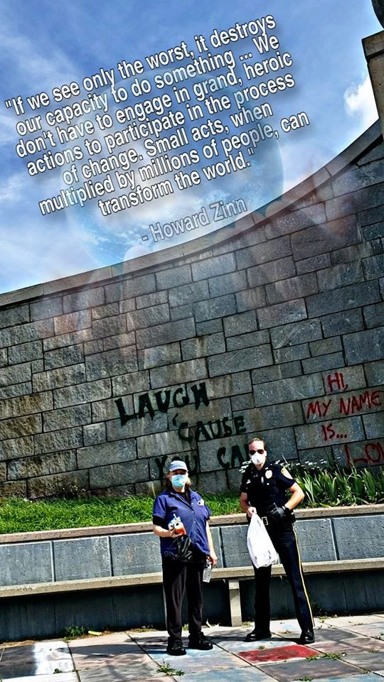 Image may contain: one or more people, people standing, child, cloud, text and outdoor