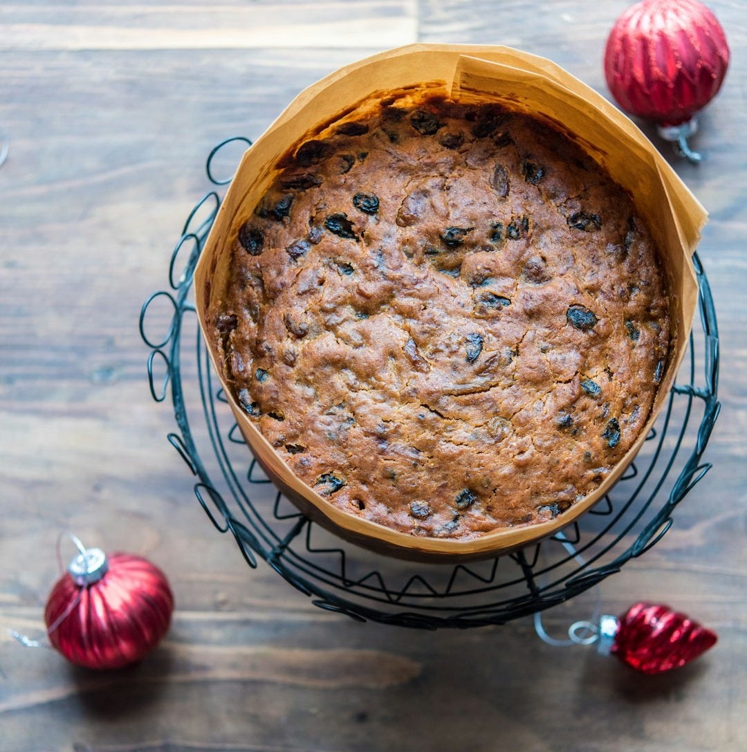 a cake sitting on top of a metal rack