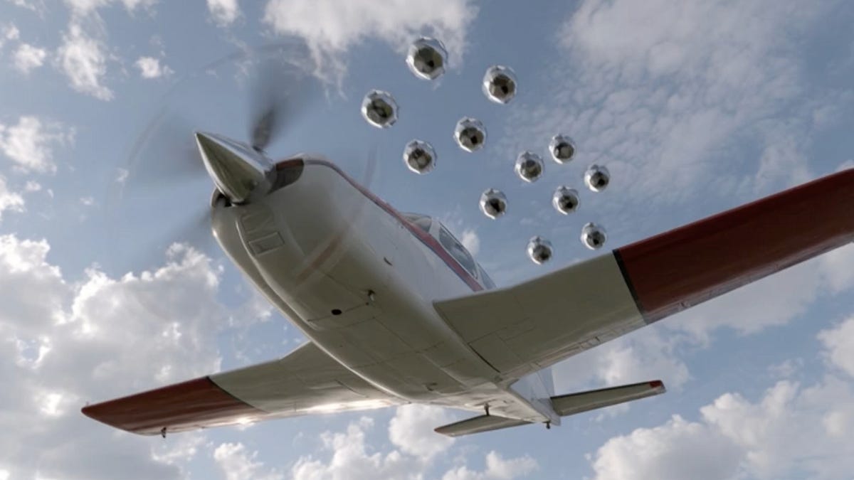 British Pilot Saw 12 Black Spheres Flash Past His Aircraft