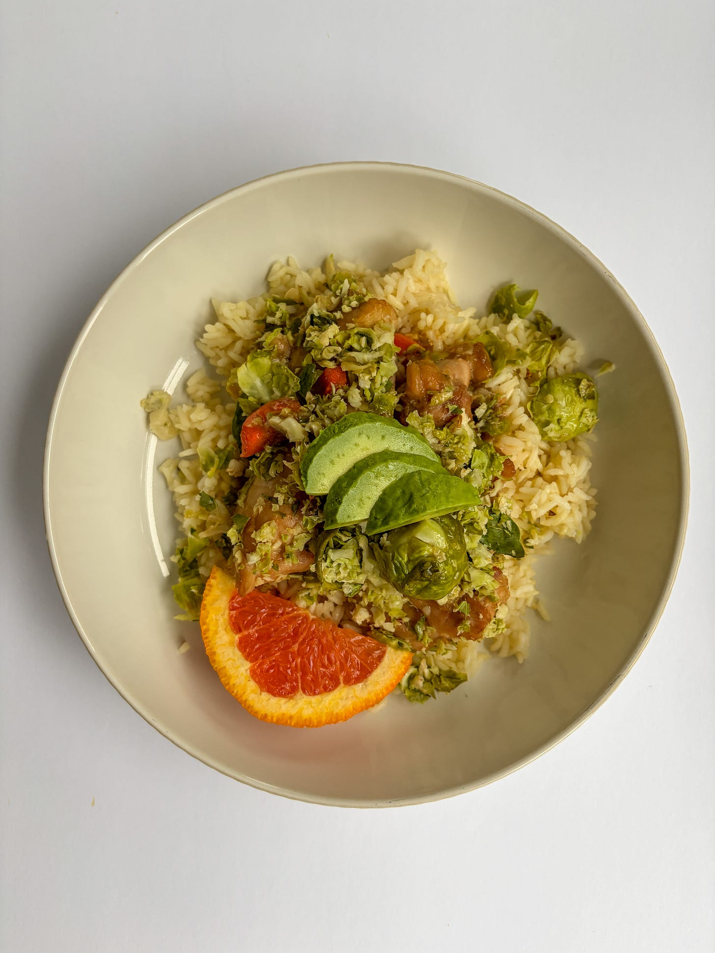 Honey Dijon chicken with roasted brussels sprouts and carrots, bone broth rice, sliced avocado, and bright blood orange slice Honey Dijon chicken with roasted brussels sprouts and carrots, bone broth rice, sliced avocado, and bright blood orange slice