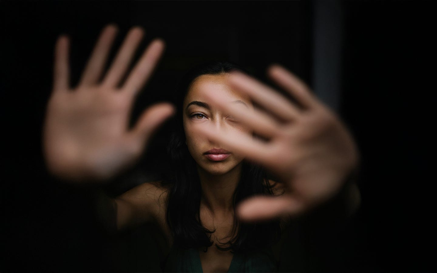 Looking through parted fingers