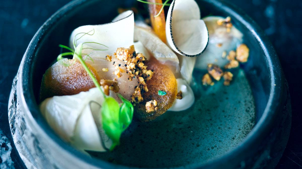 A dish of amberjack and mushrooms.