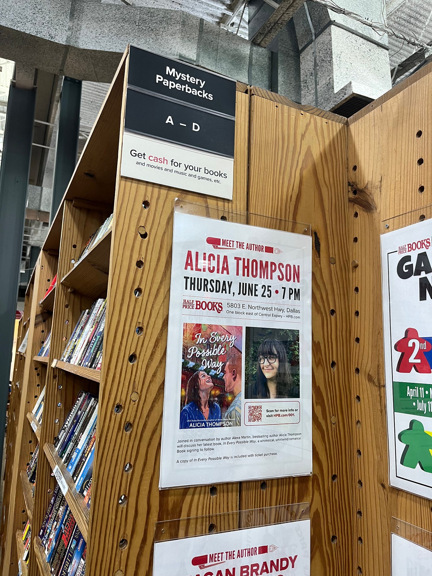 Photo from Half Price Books in Dallas showing flyer for Alicia Thompson book event
