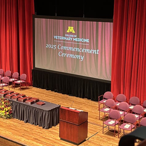 an empty stage set for graduation, 126 veterinary students, a mom and 2 daughters - one who is graduate