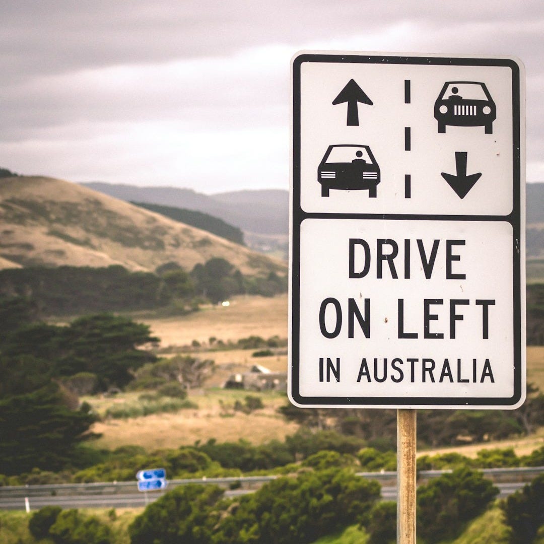 Drive On left street signage