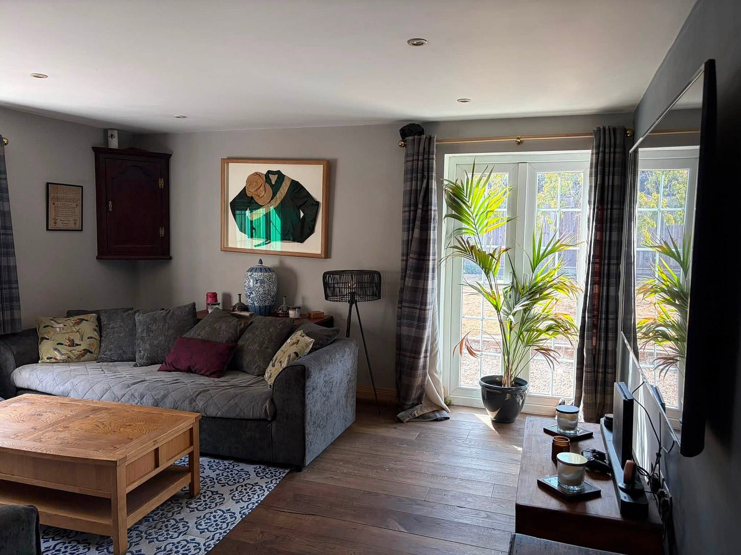 May be an image of living room, indoors and bedroom