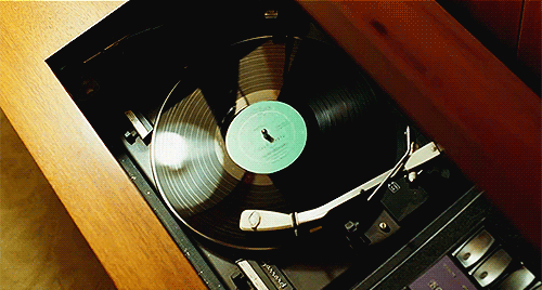 A serious man, record player