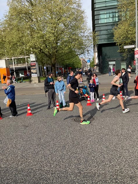 Various photos of the author running the Hannover Marathon