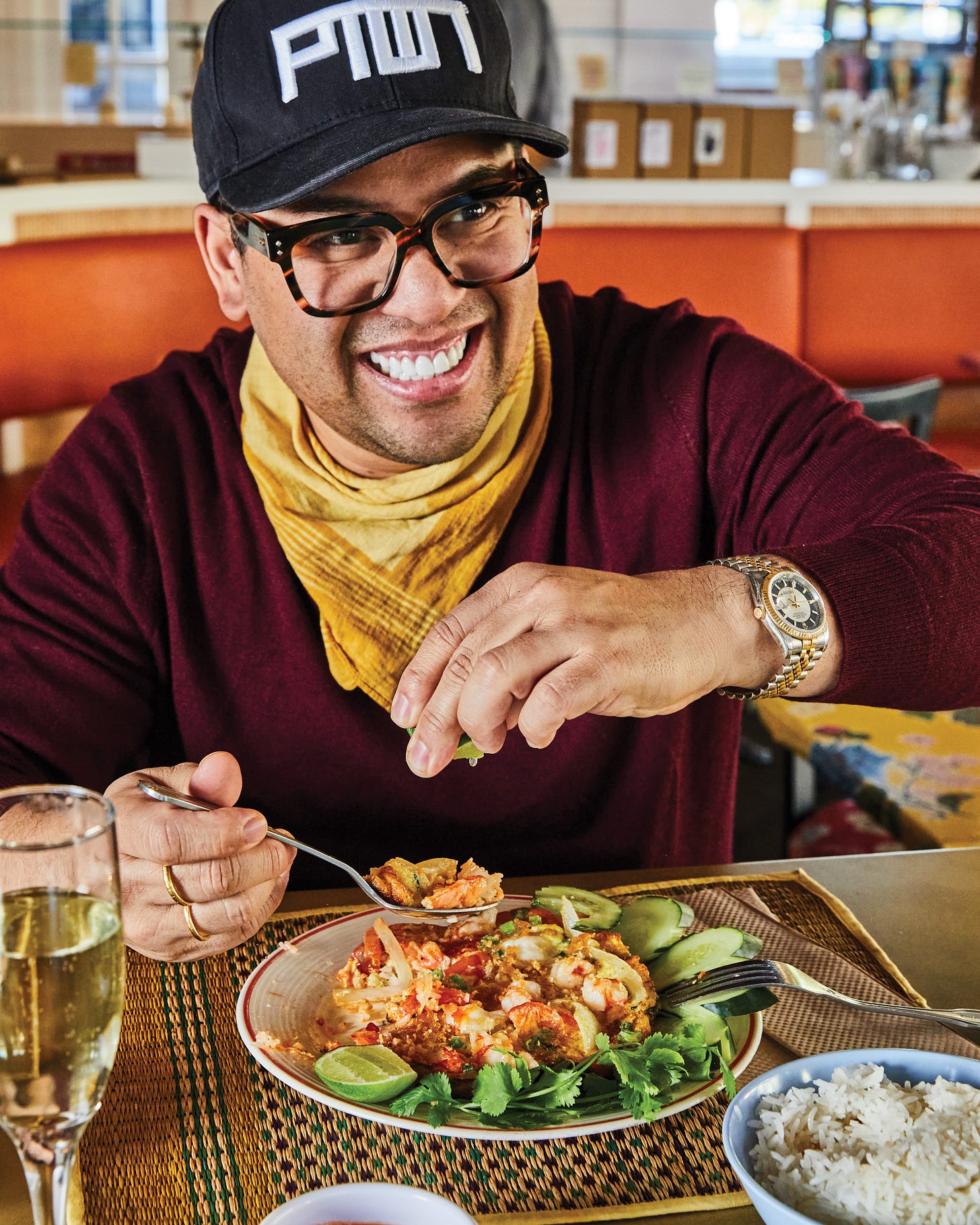 Arnold digging into a Thai omelet.