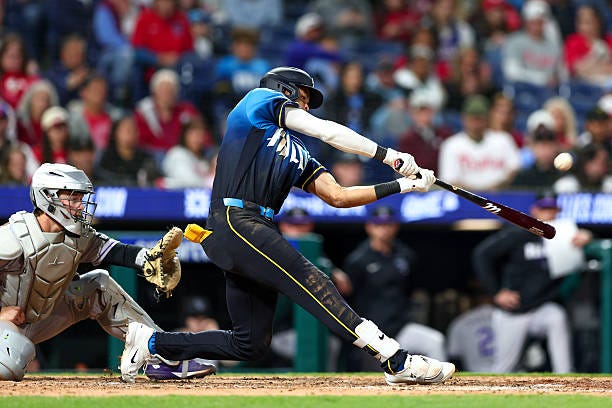 Justin Crawford of the Philadelphia Phillies hits a two-run home run in the eighth inning against the Colorado Rockies at Citizens Bank Park on May...