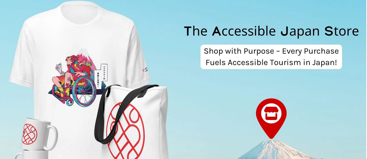 Promotional image for the Accessible Japan Store showing a white T-shirt featuring an illustration of a wheelchair user exploring Japan, a white tote bag with the Accessible Japan logo, and a matching mug. The background shows Mount Fuji under a blue sky with text reading “Shop with Purpose – Every Purchase Fuels Accessible Tourism in Japan!”
