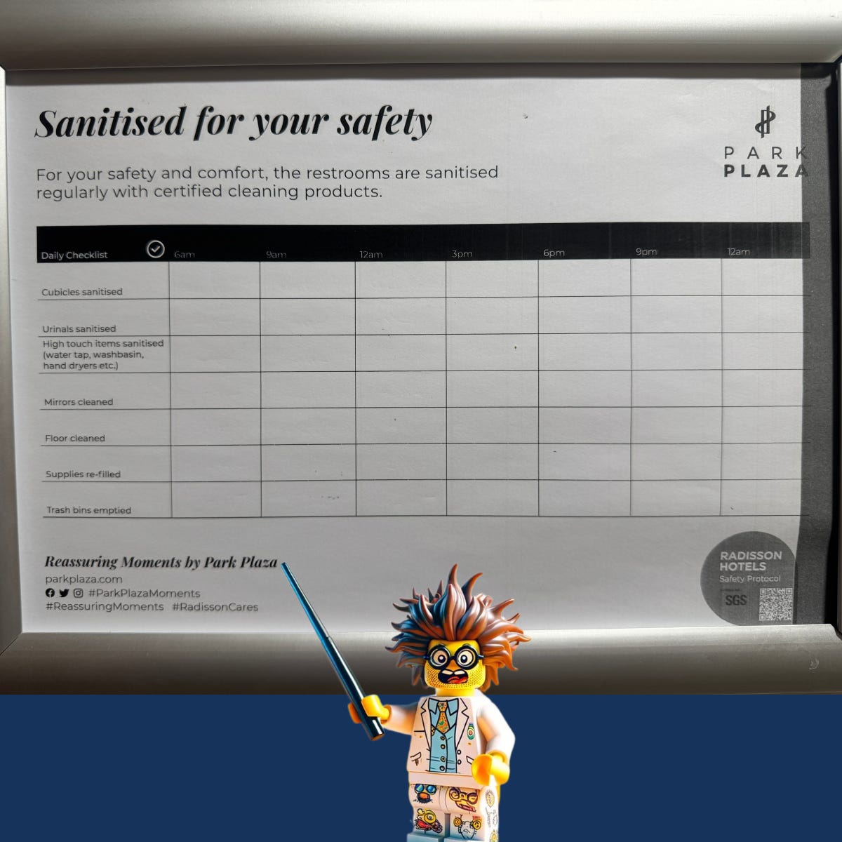 A cleaning daily checklist for Park Plaza which says ‘sanitised for your safety’ but is completely blank, showing no cleaning has been done at all. There is a lego professor pointing to the sheet with a stick, looking outraged.
