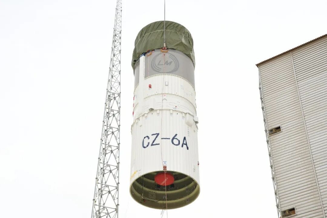 The second-stage of the Long March 6A vehicle being lifted onto Launch Complex 9A. The second-stage of the Long March 6A vehicle being lifted onto Launch Complex 9A.