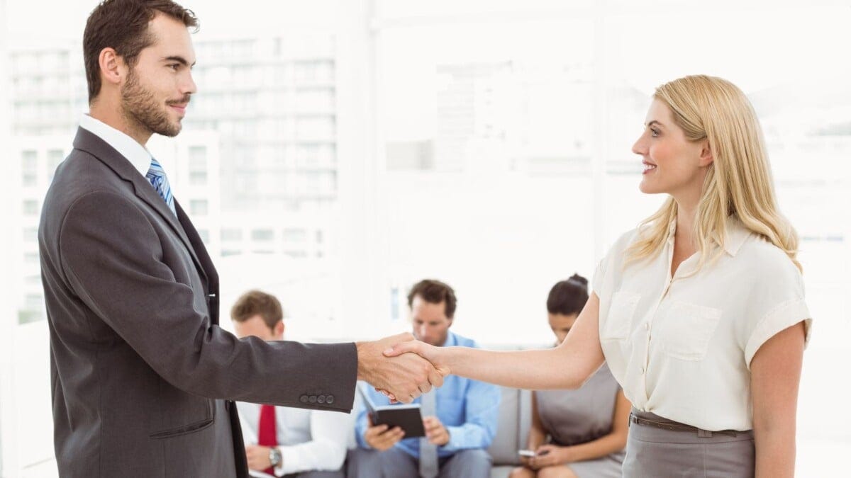 handshake hello job man woman work
