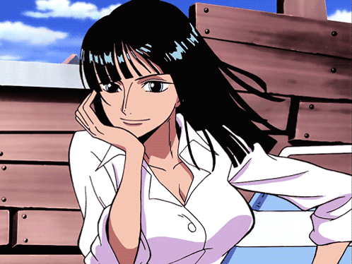 a woman in a white shirt with her hand on her face