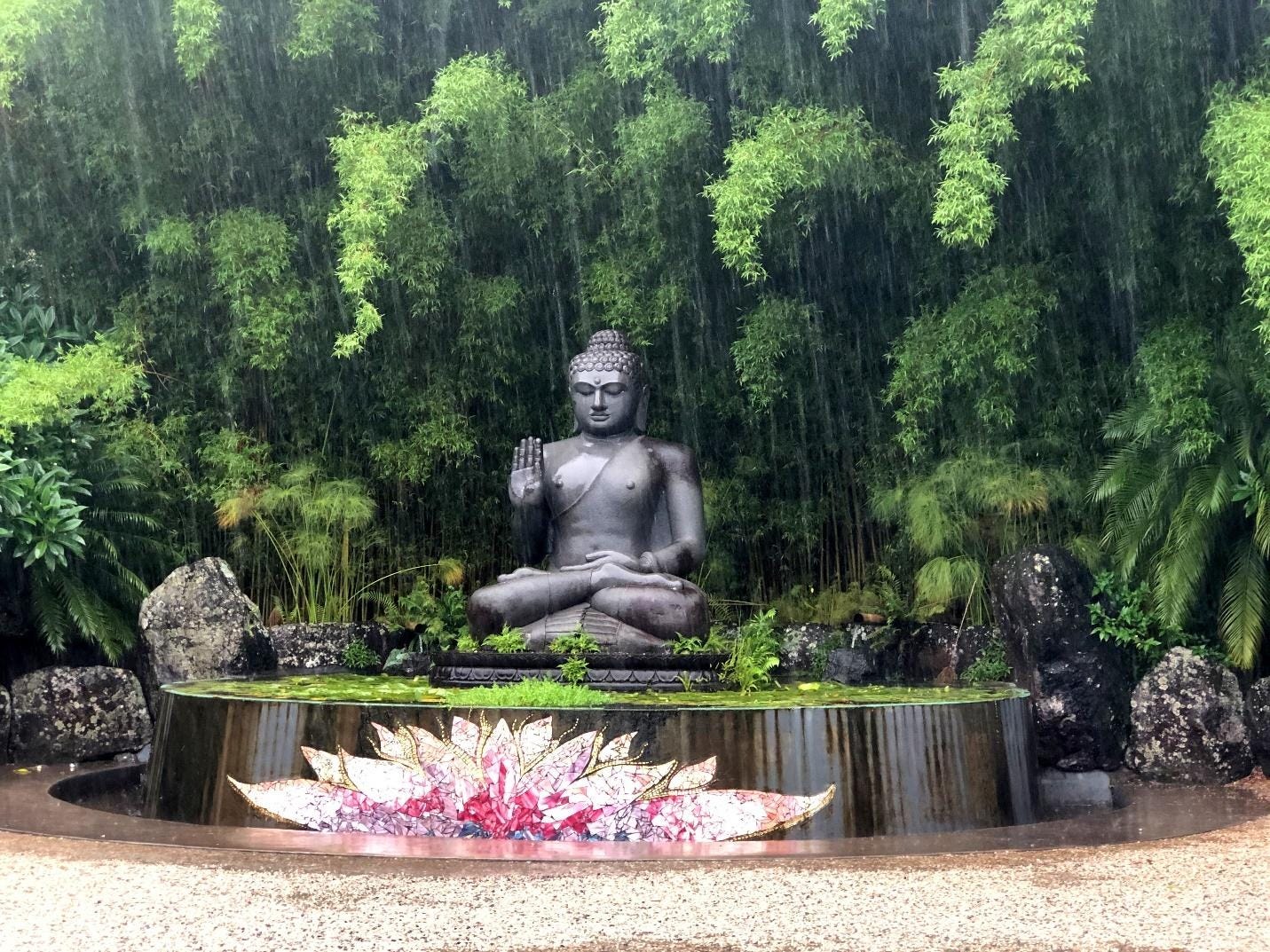 A statue of a buddha in the rain

AI-generated content may be incorrect.