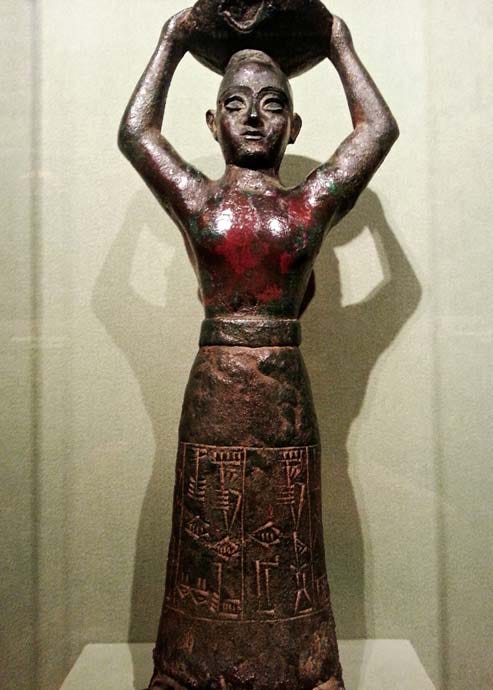 Inscription: "Ur-Namma, king of Ur, king of Sumer and Akkad, the one who built the temple of Enlil”. Foundation figure, c. 2075 BCE 