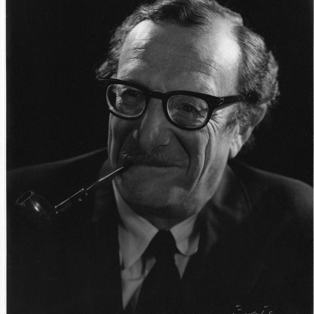Eric Berne portrait with pipe (black background) — Calisphere