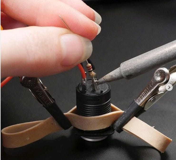 Rubber band helping hand.