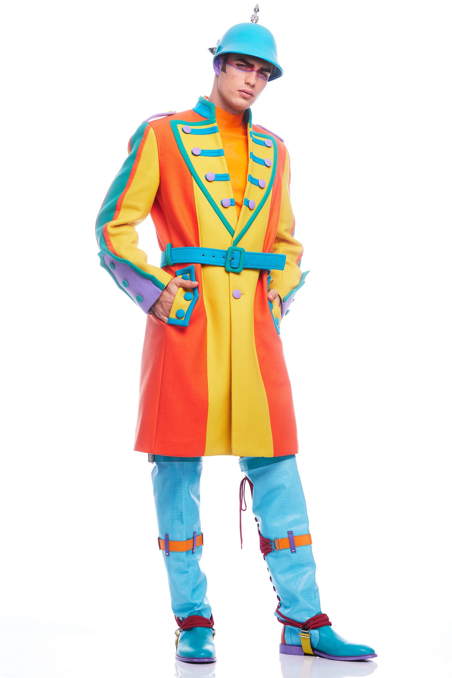 Image may contain Clothing Apparel Coat Human Person Overcoat Helmet Sleeve and Suit