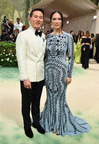 Image may contain Adult Person Clothing Footwear Shoe Accessories Formal Wear Tie Dress Suit Blazer and Coat