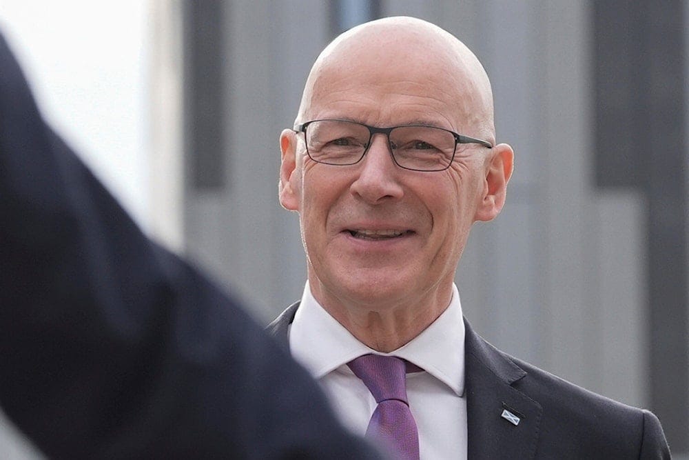 Scottish First Minister and Scottish National Party leader John Swinney arrives at York University, York, England, on June 20, 2024. (Stefan Rousseau/Stefan Rousseau/PA via AP, Pool)