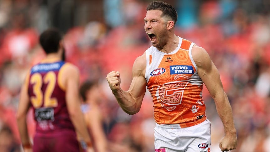 Toby Greene celebrates a goal against the Lions Toby Greene celebrates a goal against the Lions