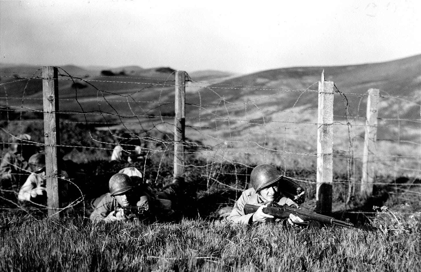 Company crawling through barbed wire during maneuvers at Camp San Luis  Obispo, California on 30 March 1944 | The Digital Collections of the  National WWII Museum : Oral Histories