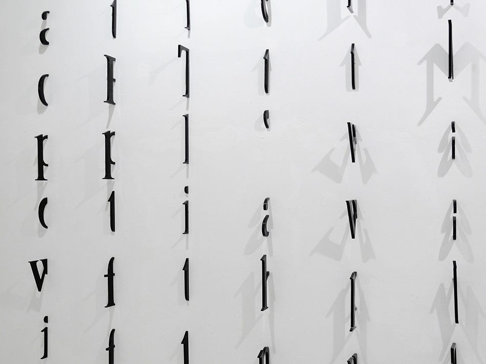 Marina Camargo, Untitled [Letras na parede], (acrylic), 2009 [Galeria Superfí­cie, São Paulo. © Marina Camargo]