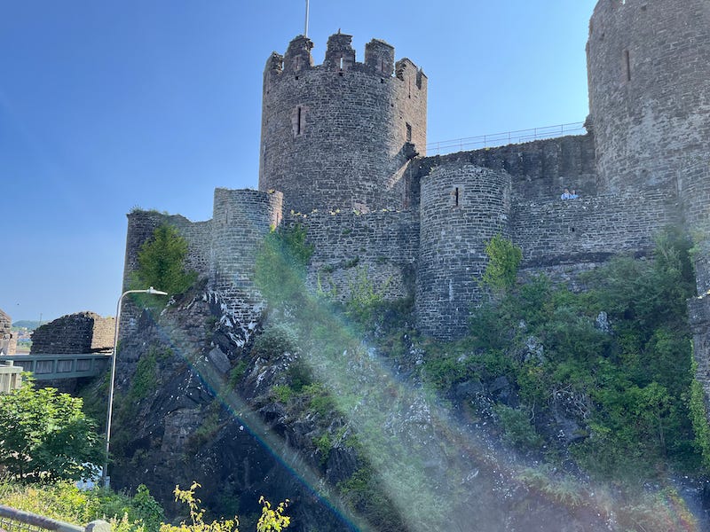 2025-6-19 Conwy Castle from the bus window by Susan Corbin
