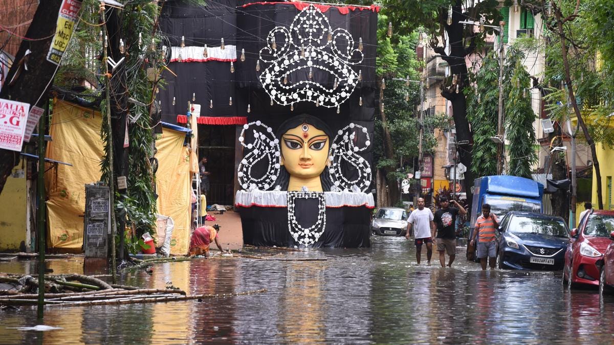 Kolkata Rain Floods Durga Puja Pandals Kolkata Rain Floods Durga Puja Pandals