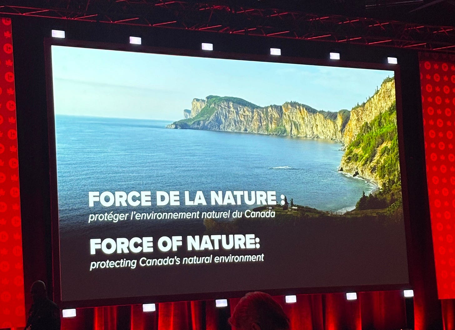 Image reads Force of Nature: Protecting Canada’s Natural Environment - Photo taken at the 2026 Liberal Policy Convention in Montreal, Quebec by Madeleine Kelly 