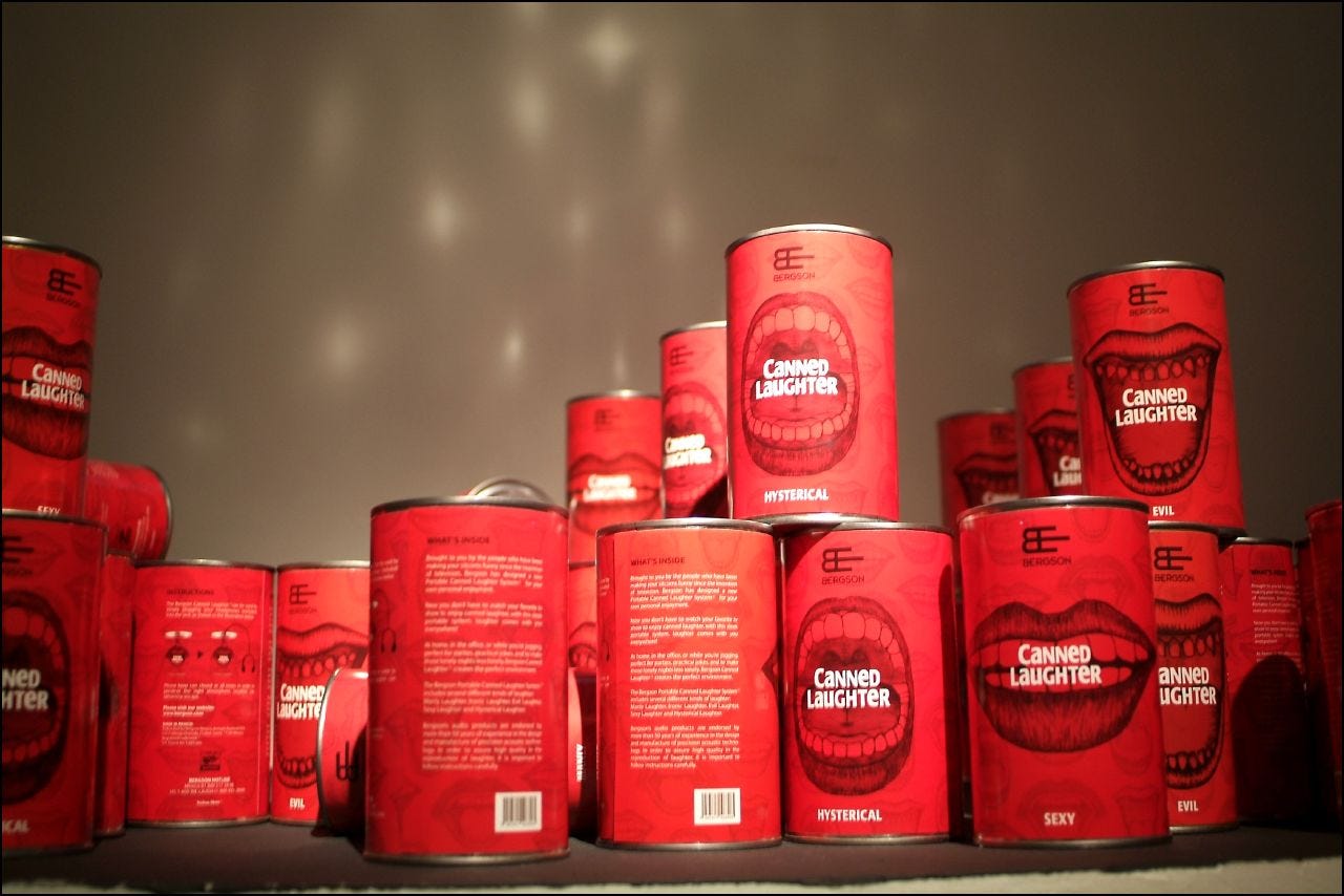 Many red cans of canned laughter.