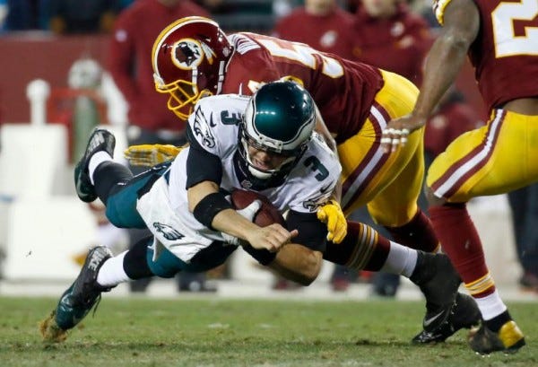 philadelphia eagles mark sanchez bulge down by trevardo williams redskins nfl 2014 images philadelphia eagles mark sanchez bulge down by trevardo williams redskins nfl 2014 images