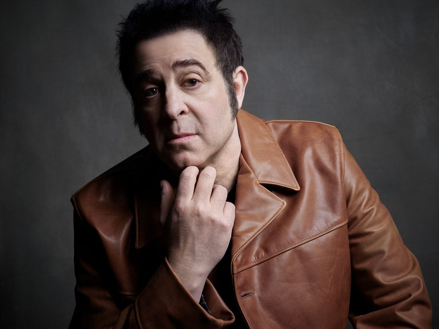 Image may contain Adam Duritz Clothing Coat Jacket Face Head Person Photography Portrait and Adult