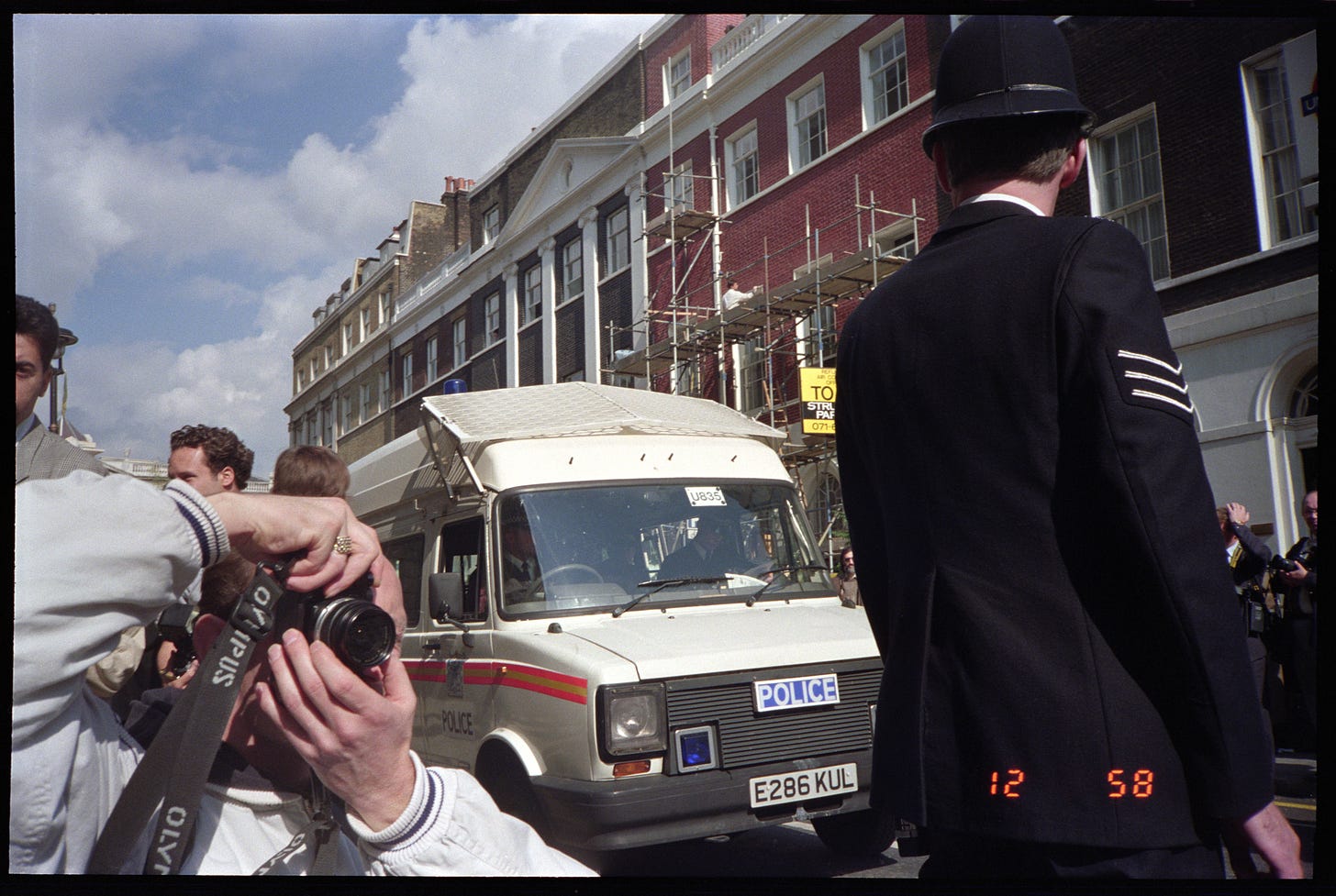 Keith Armstrong photographing disability-rights protests in London in the 1990s. Credit: Keith Armstrong/NDMAC