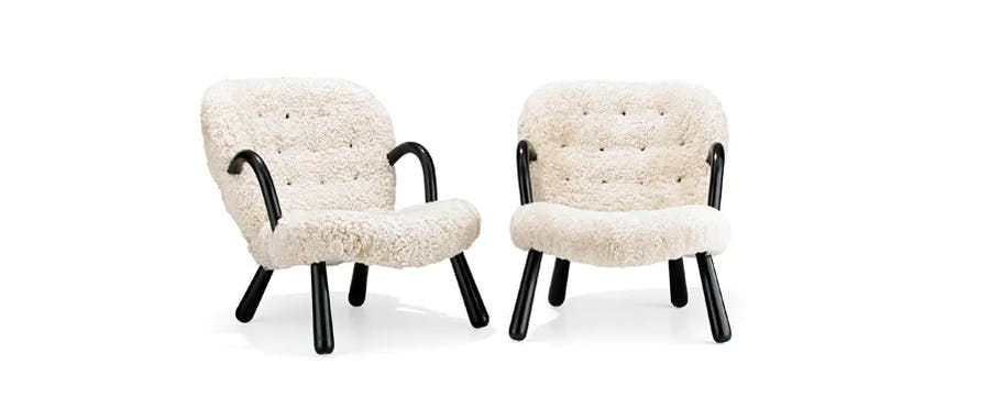 A pair of Clam chairs.