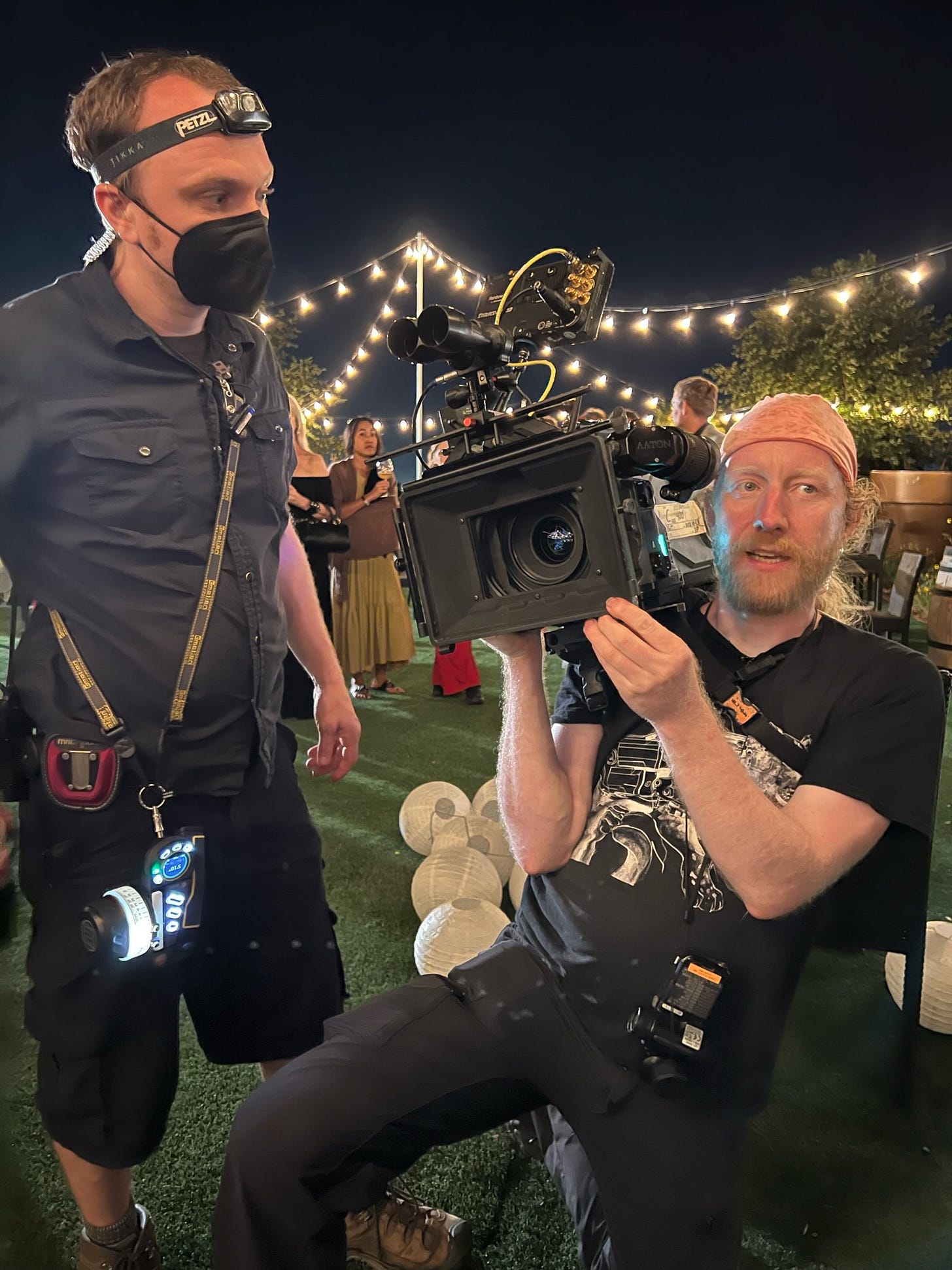 1st AC Andrew Parrotte and cinematographer David Auner discuss filming a bustling wedding reception scene.