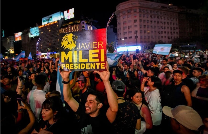 A group of people holding signs

AI-generated content may be incorrect.